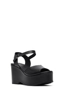 Kadın Siyah Bilekten Tokalı Yüksek Dolgu Topuklu Deri Sandalet | Derimod