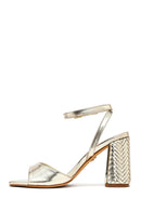 Kadın Altın Bilekten Tokalı Yüksek Kalın Topuklu Metalik Sandalet | Derimod