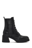 Women's Black Zippered Thick Heeled Leather Ankle Boots | Derimod