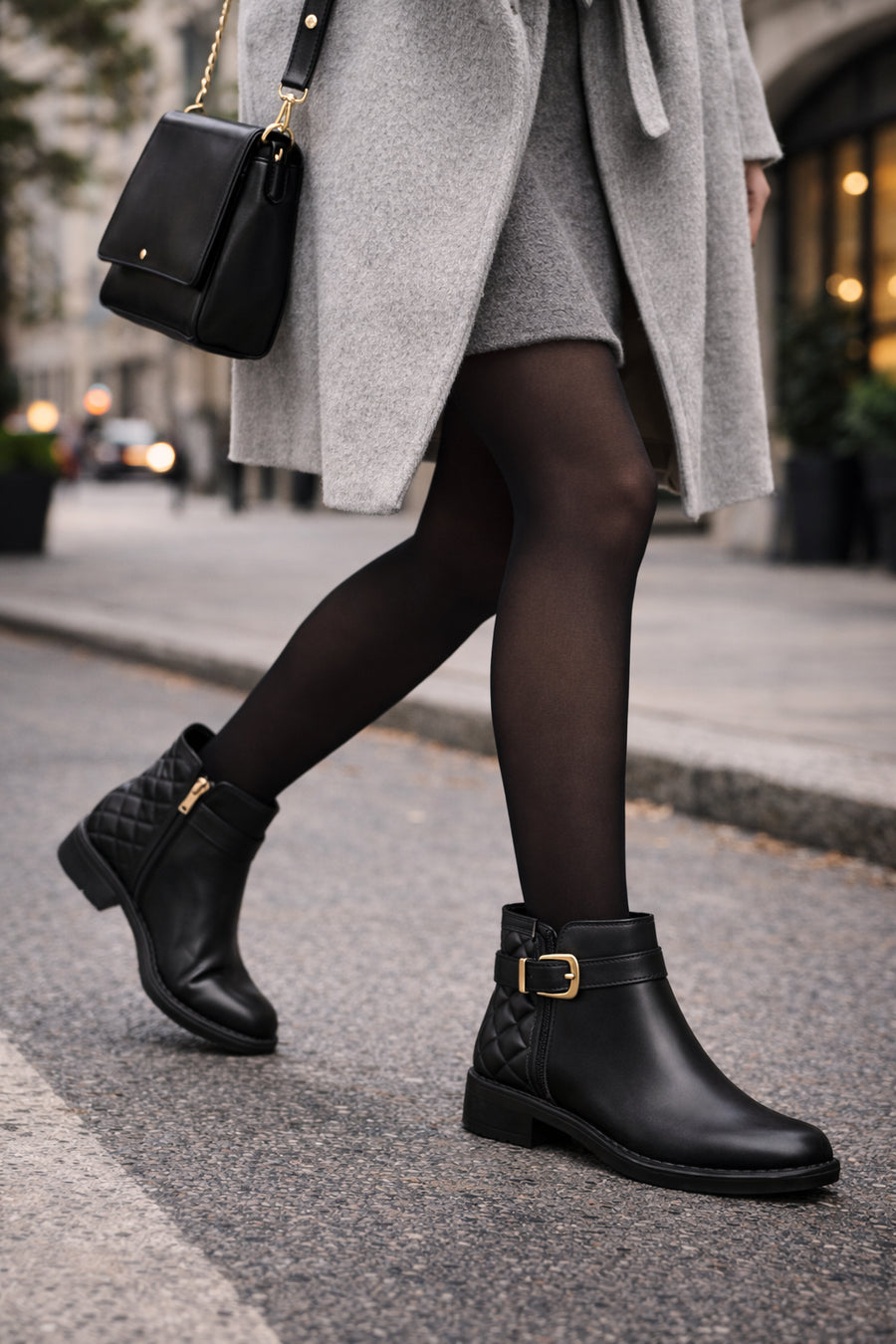 Woman Black Zippered Buckled Boots