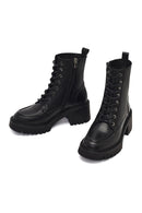 Women's Black Zippered Thick Heeled Leather Ankle Boots | Derimod